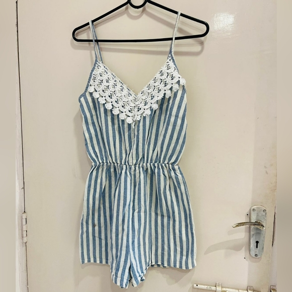 Blue and white lining romper